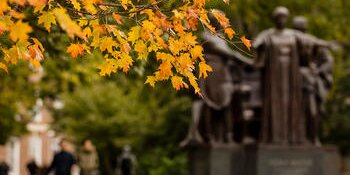 alma mater statue in fall