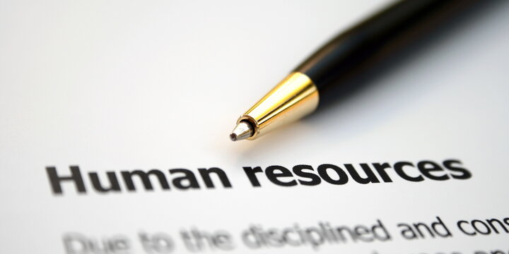Pen laying over human resources document