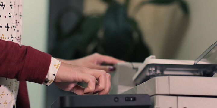 Woman using printer