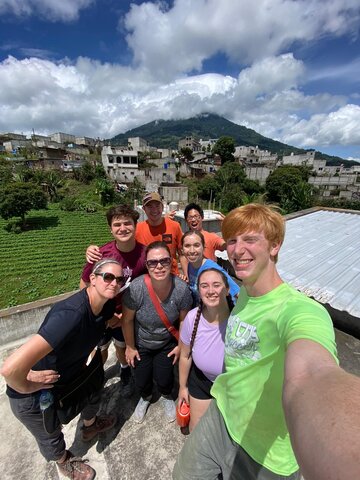 Teachers and students smiling during volunteer trip to Guatemala 