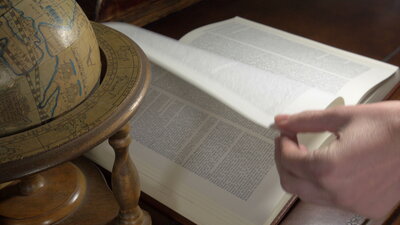 Turning a page of an old book