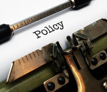Policy written on typewriter