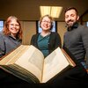 RBML curator Cait Coker, RBML head Lynne M. Thomas and Elias Petrou, the librarian for classical studies, medieval studies and modern Greek studies, are pictured with the volume.