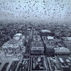 Water drops flow and settle on the windows of the Torre Latinoamericana in Mexico City.