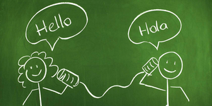 Chalkboard with "hello" and "hola"