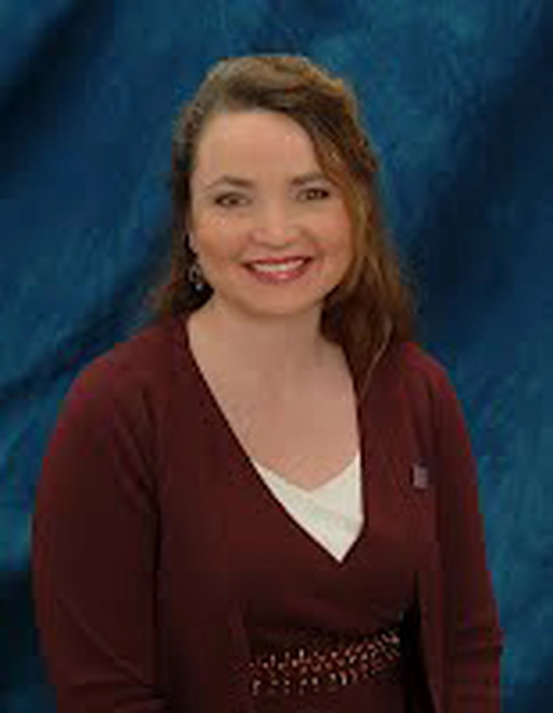 Joy Nevin Axelson, French '91, putting her French to work