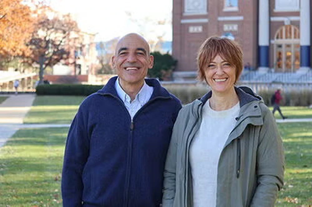 Couple posing for photo on the Quad