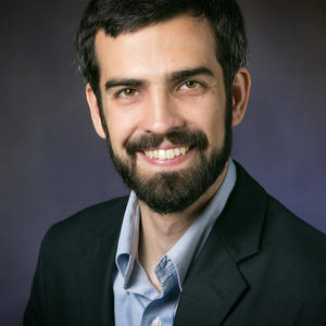 Michael Dann, CAS Fellow