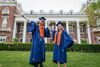 New LAS graduates pose and throw confetti