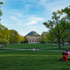 Students sitting on grass on Quad 